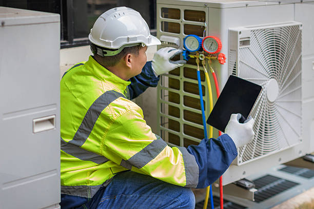 Professional Hvac technician working in Oyster Bay, NY